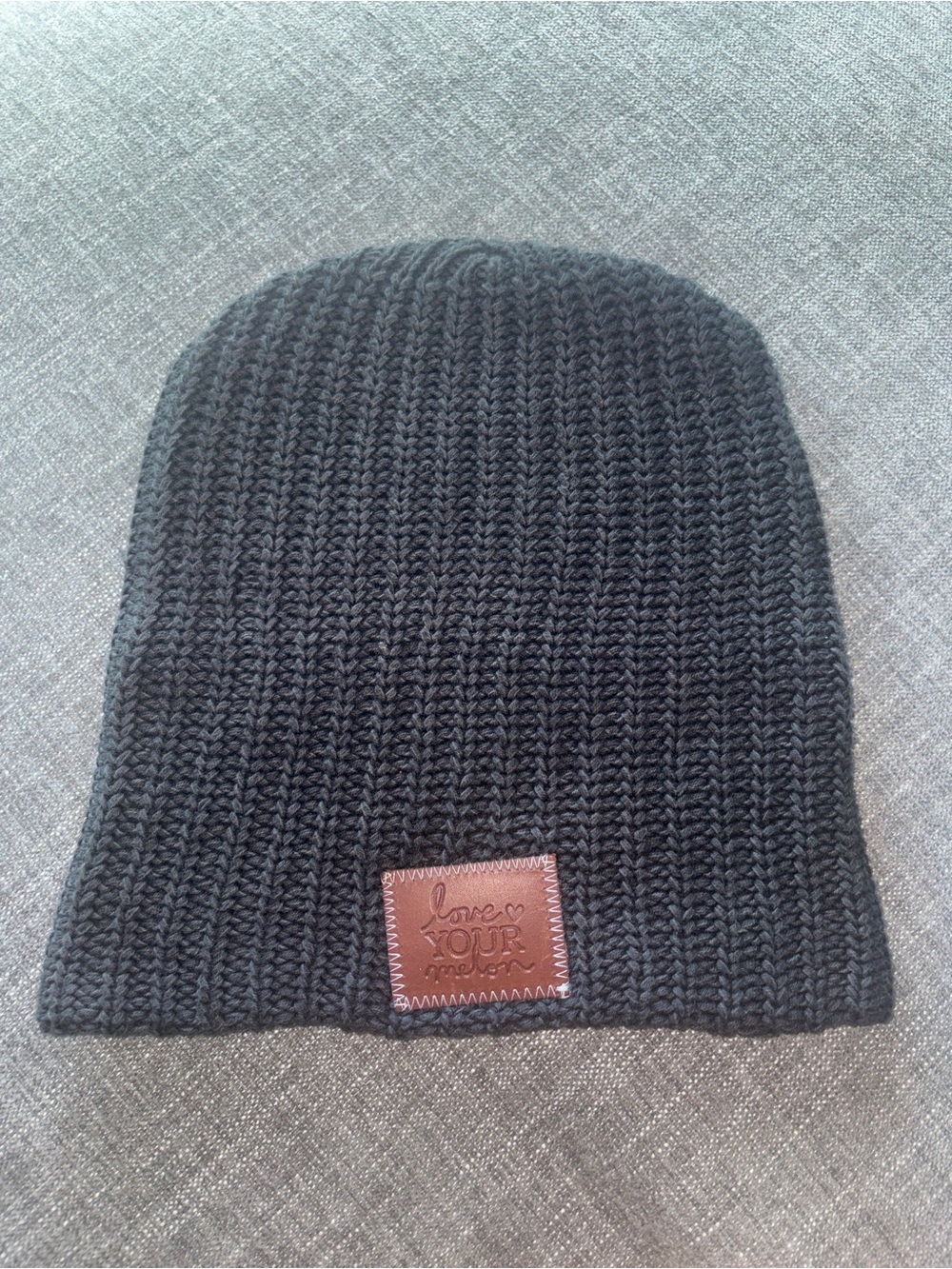 Love Your Melon Black Knit Beanie with Brown Leather Patch